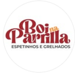 Boi na parrilha gama, desenho da logo redonda com fundo branco e o nome boi na parrilha em vermelho